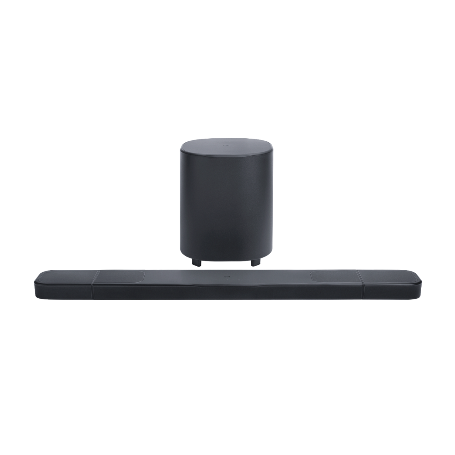 Configuration barre de son et caisson de basses JBL, tout en noir, sur fond noir.