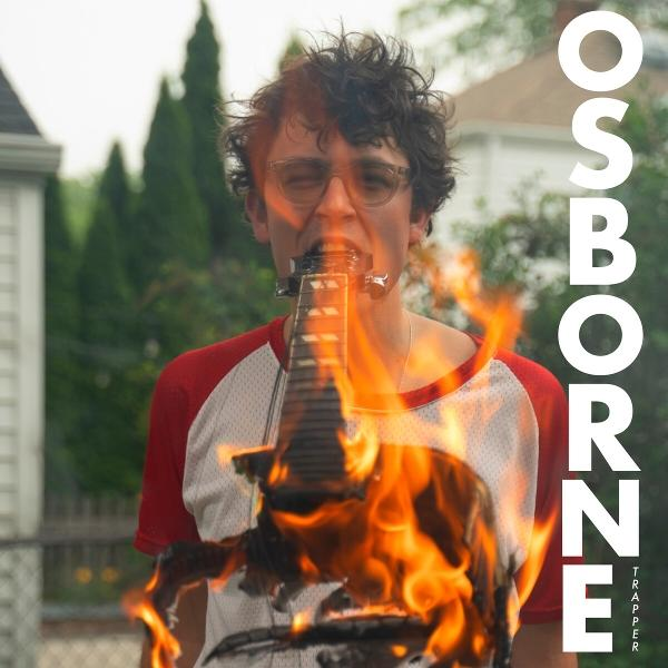 Albumcover-Artwork: Mann mit Brille, isst eine brennende Gitarre. Das Wort OSBORNE ist vertikal geschrieben.