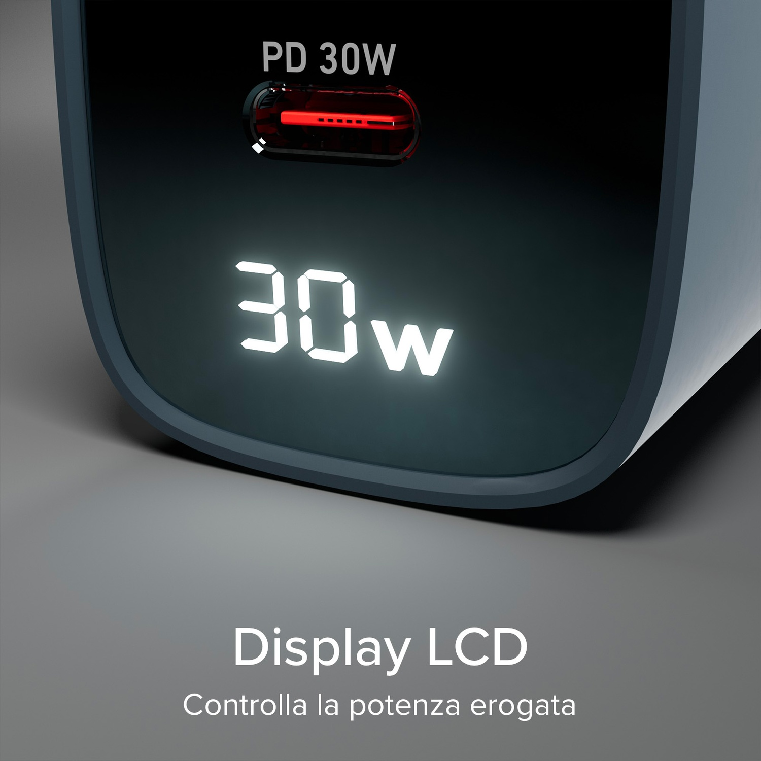 Un caricatore nero con display digitale che mostra 30W. Sono visibili PD 30W e una linea rossa.