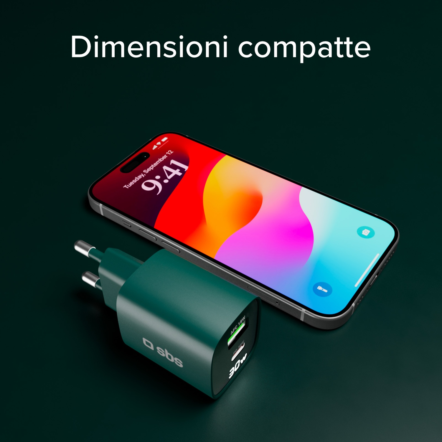 Un telefono accanto a un caricatore. Il telefono mostra l'ora 9:41. Il caricatore ha un display da 30W.