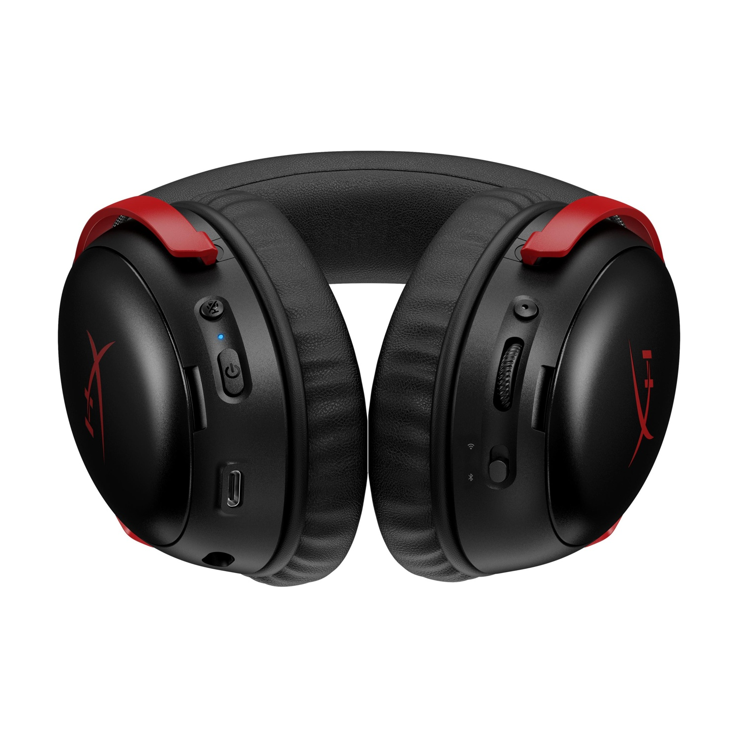 Cuffie da gaming nere e rosse. Controlli sul padiglione destro. Sfondo bianco.