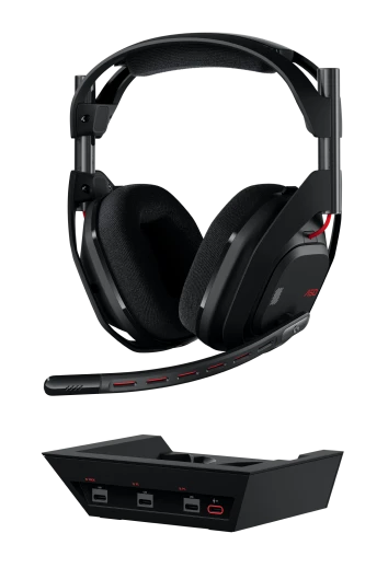 Czarny zestaw słuchawkowy do gier na czarnej podstawie. Czerwone akcenty. Widok z góry. Ciemne tło.