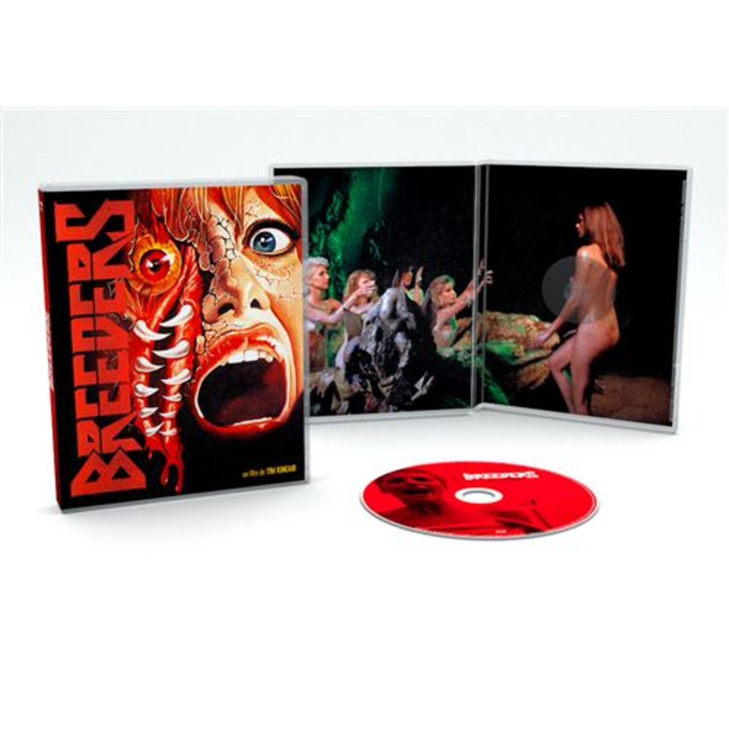 Boîtier DVD avec le film 'Breeders'. Il présente le visage d'une femme coupé en deux avec un œil grotesque. Rouge.