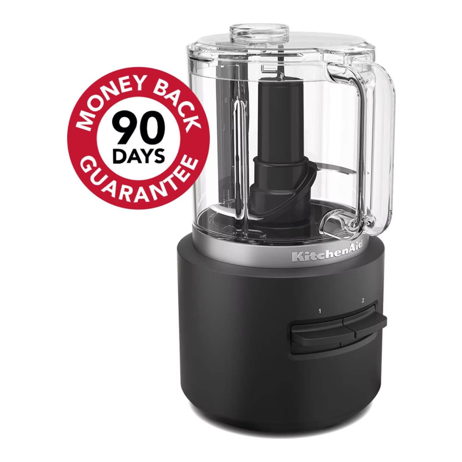 Een zwarte KitchenAid-foodprocessor met een label met geld-terug-garantie.