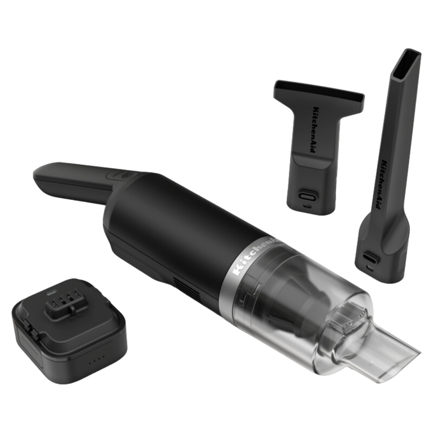 Zwarte draagbare stofzuiger en accessoires: oplader en twee opzetstukken.