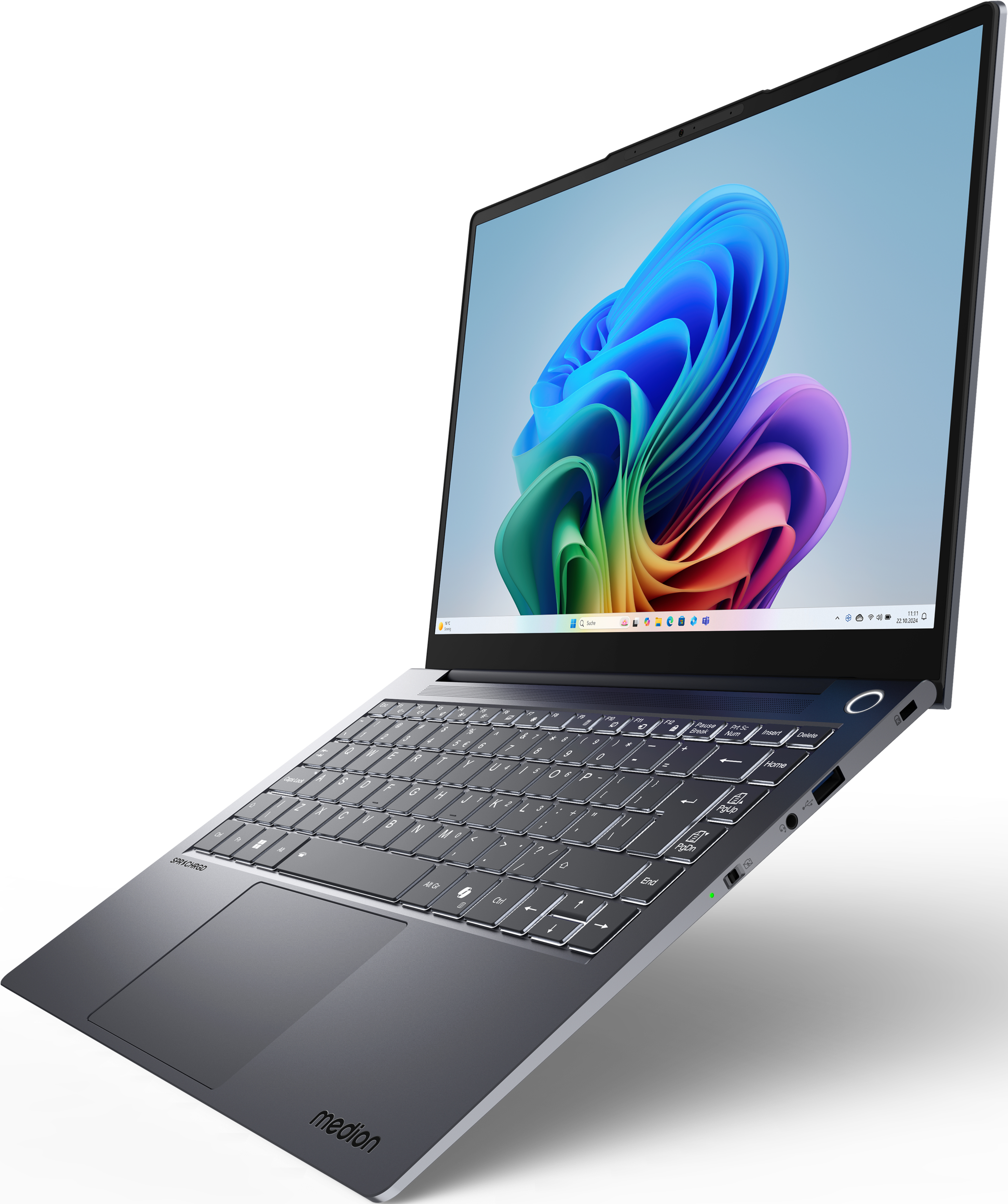 Laptop aperto. Schermo mostra arte astratta. Tastiera e trackpad visibili. Ripresa angolata, argento e nero.