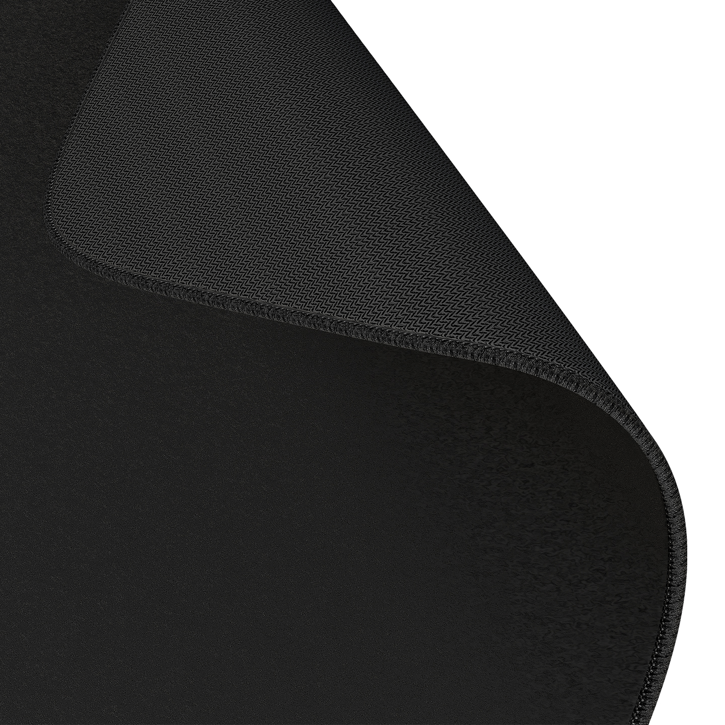 Siyah mousepad'in altı, dokulu yüzeyi gösteriyor.