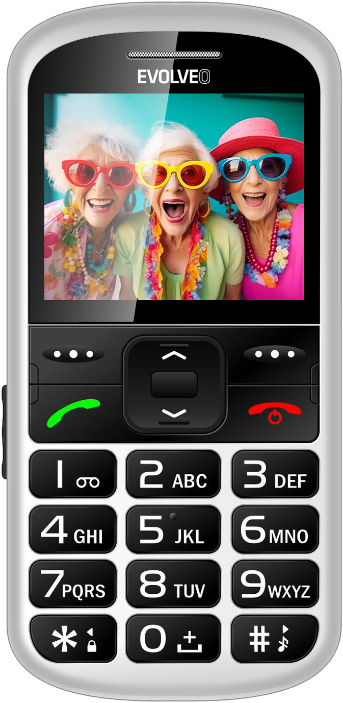 Egy fehér telefonon három idős nő látható napszemüvegben és virágfüzérrel. A telefon gombjai nagyok és könnyen olvashatók.