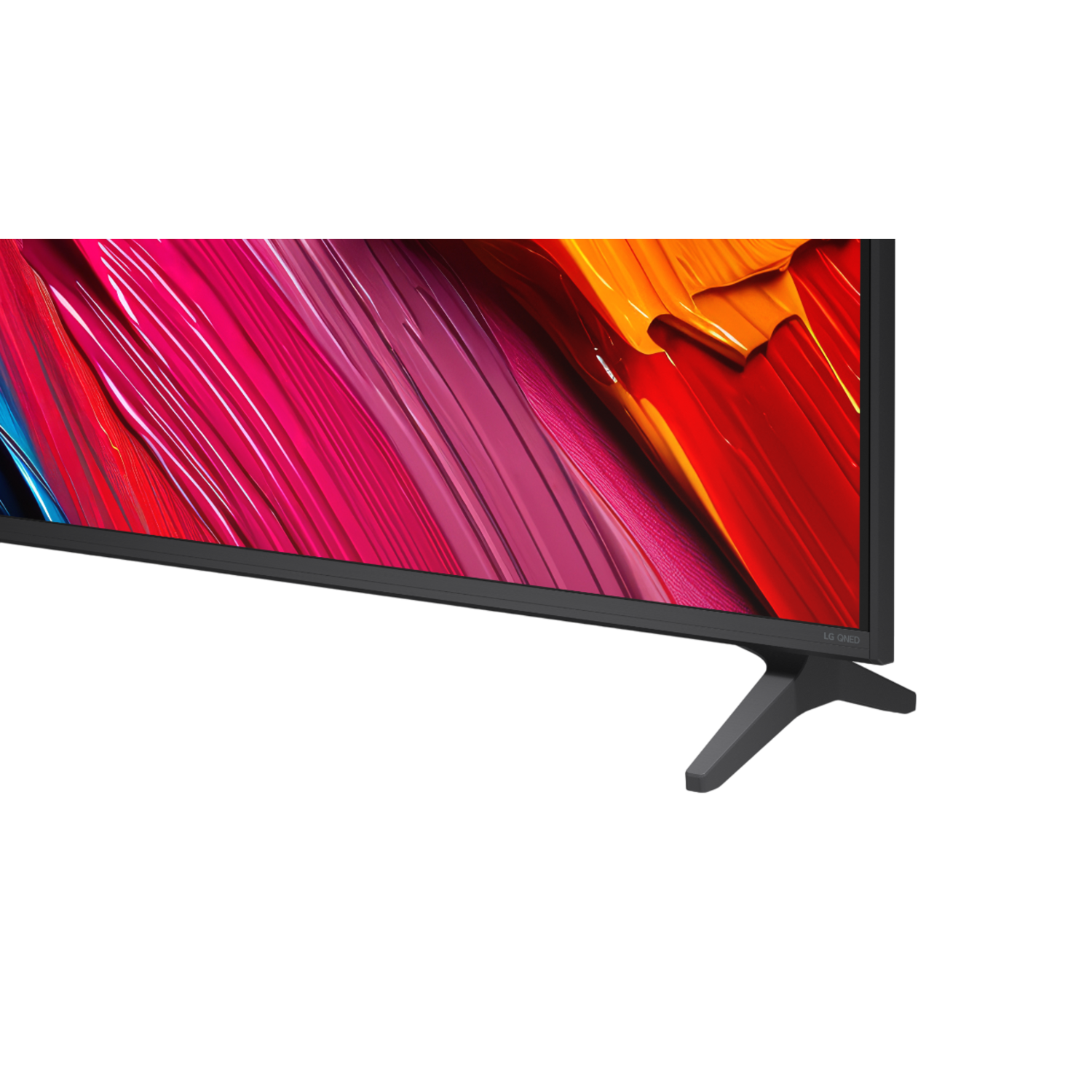 Close-up of a TV's bottom right corner, showing colorful brush strokes and a leg.