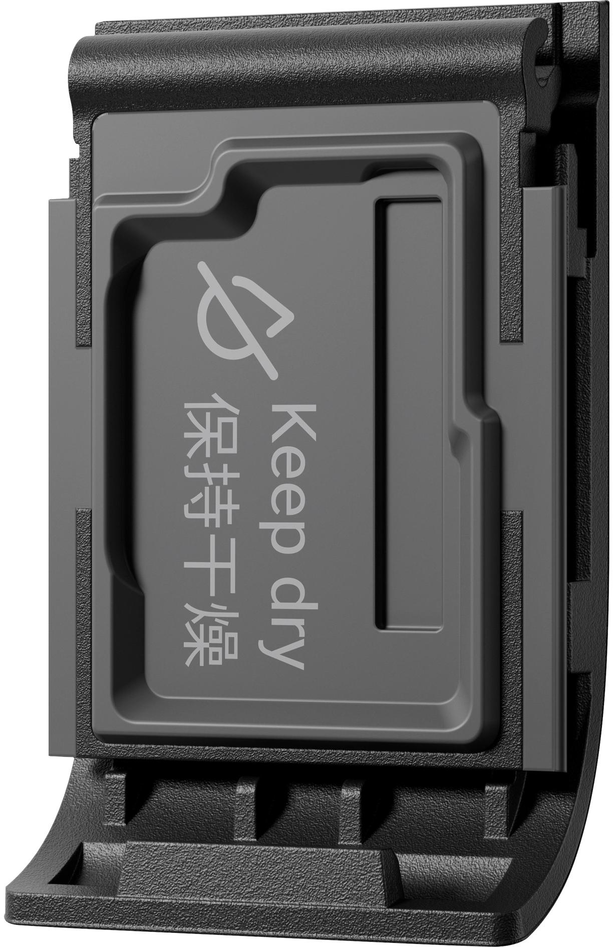Graues Kunststoffteil mit 'Keep dry' Text. Schwarzer Rahmen umgibt es. Die Form ist rechteckig.