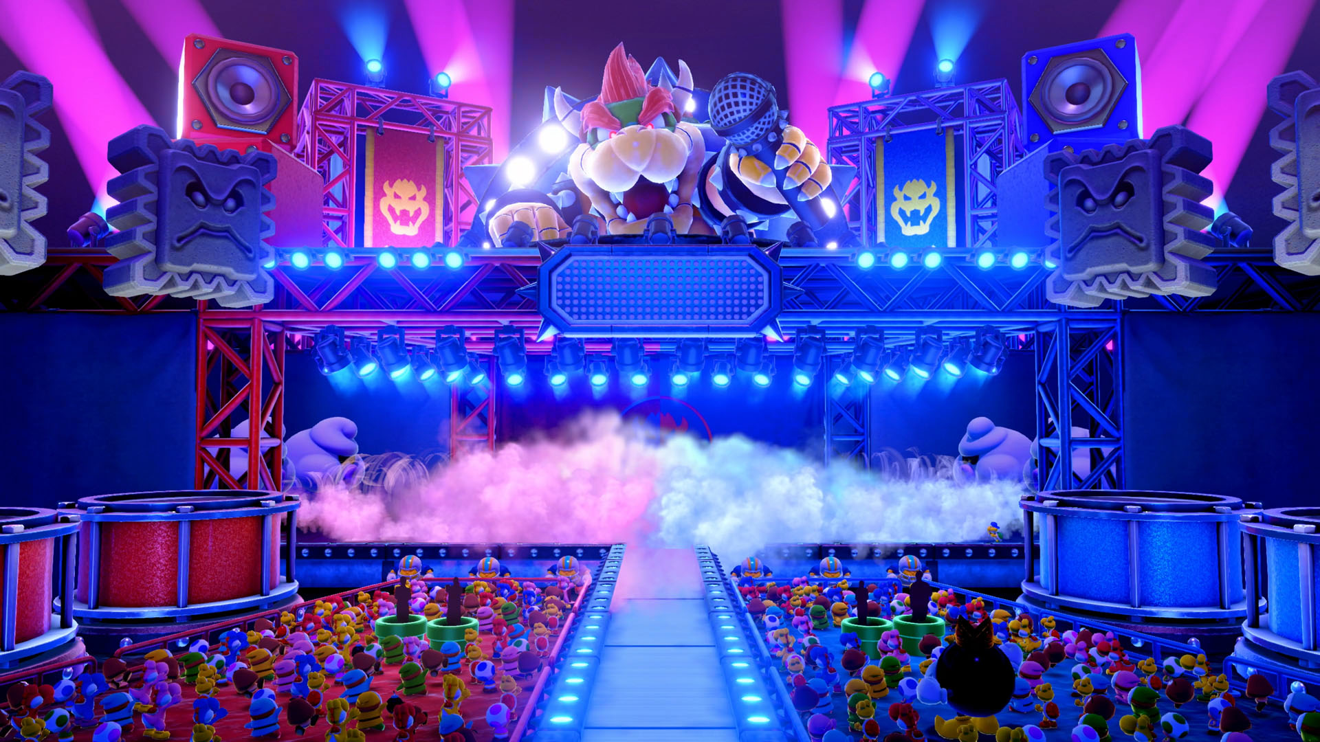 Mario Party oyunu. Sahnedeki karakterler, seyirci ve ortada Bowser.