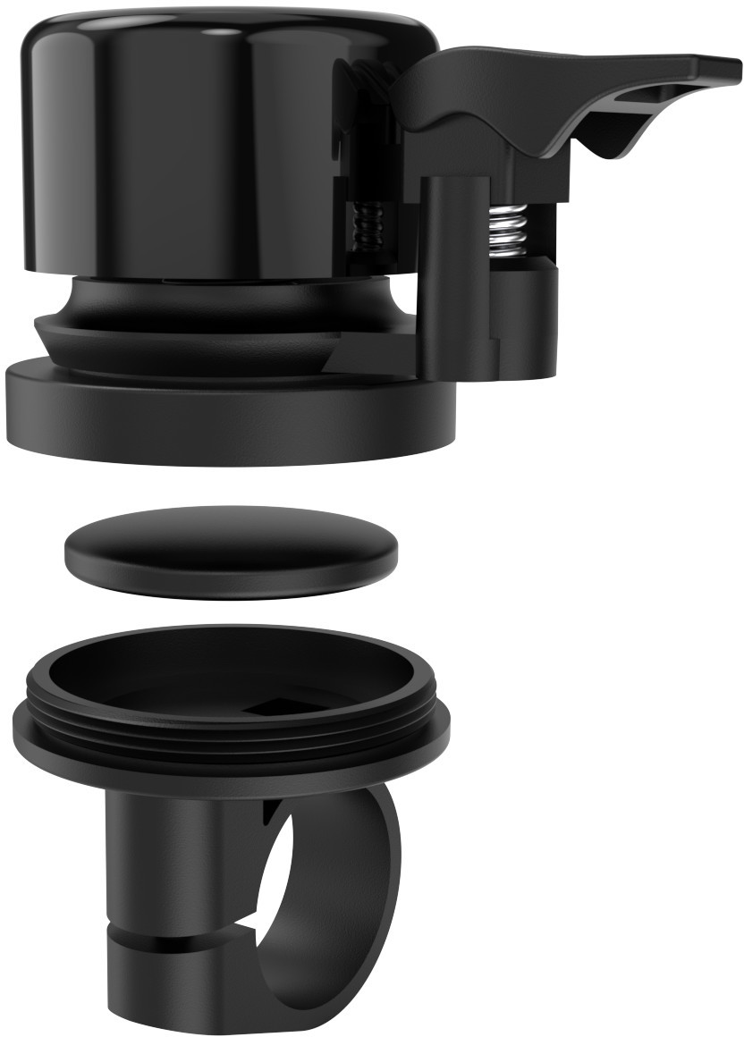 Czarny dzwonek rowerowy, rozebrany. Elementy: dzwonek, pierścień i dźwignia.