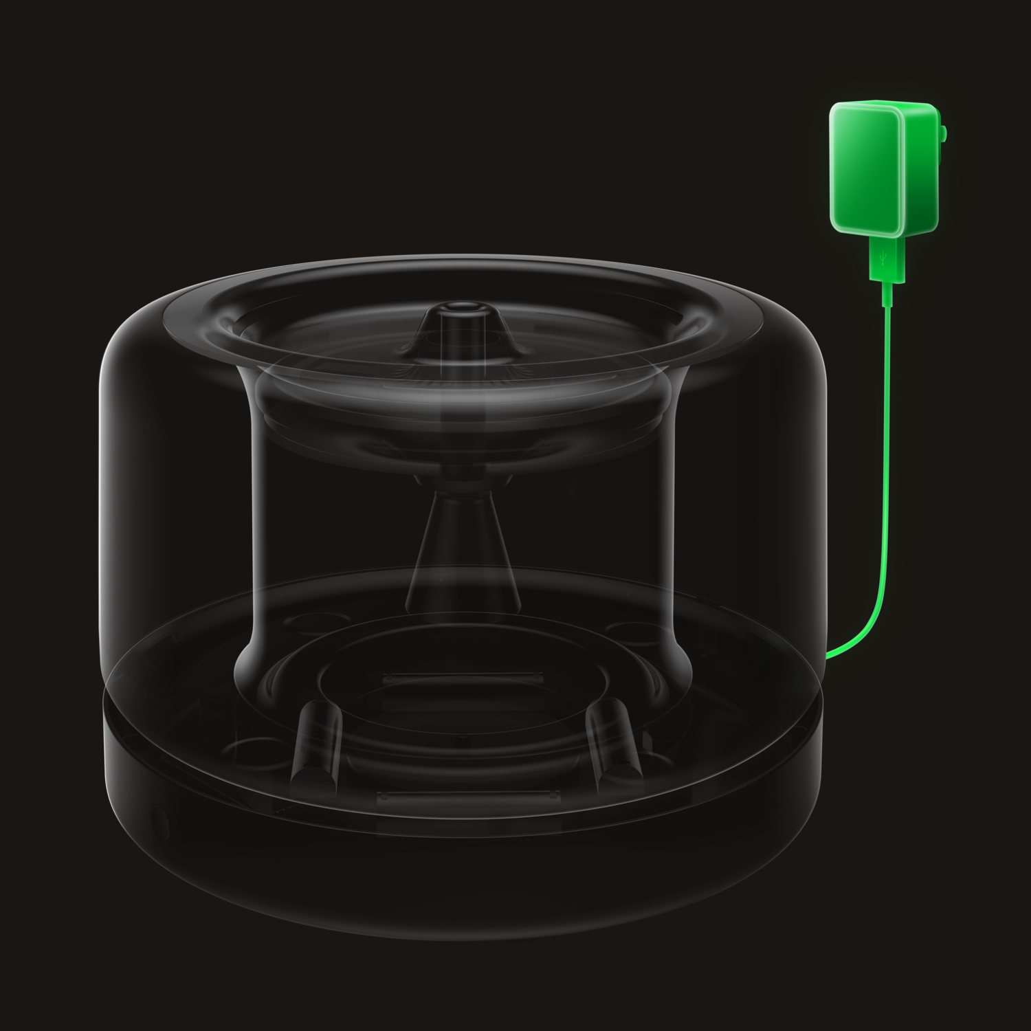 Appareil noir avec cœur translucide, adaptateur secteur vert sur fond noir.