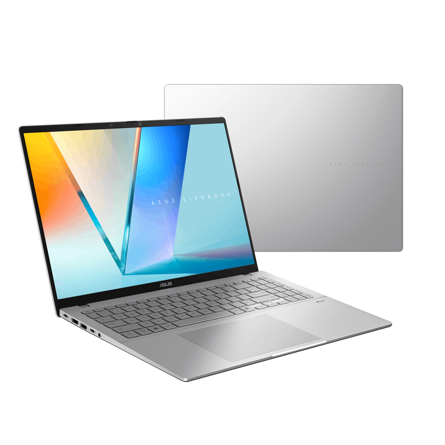 Silver laptop, open, at an angle. The screen displays an ASUS Vivobook logo and design.