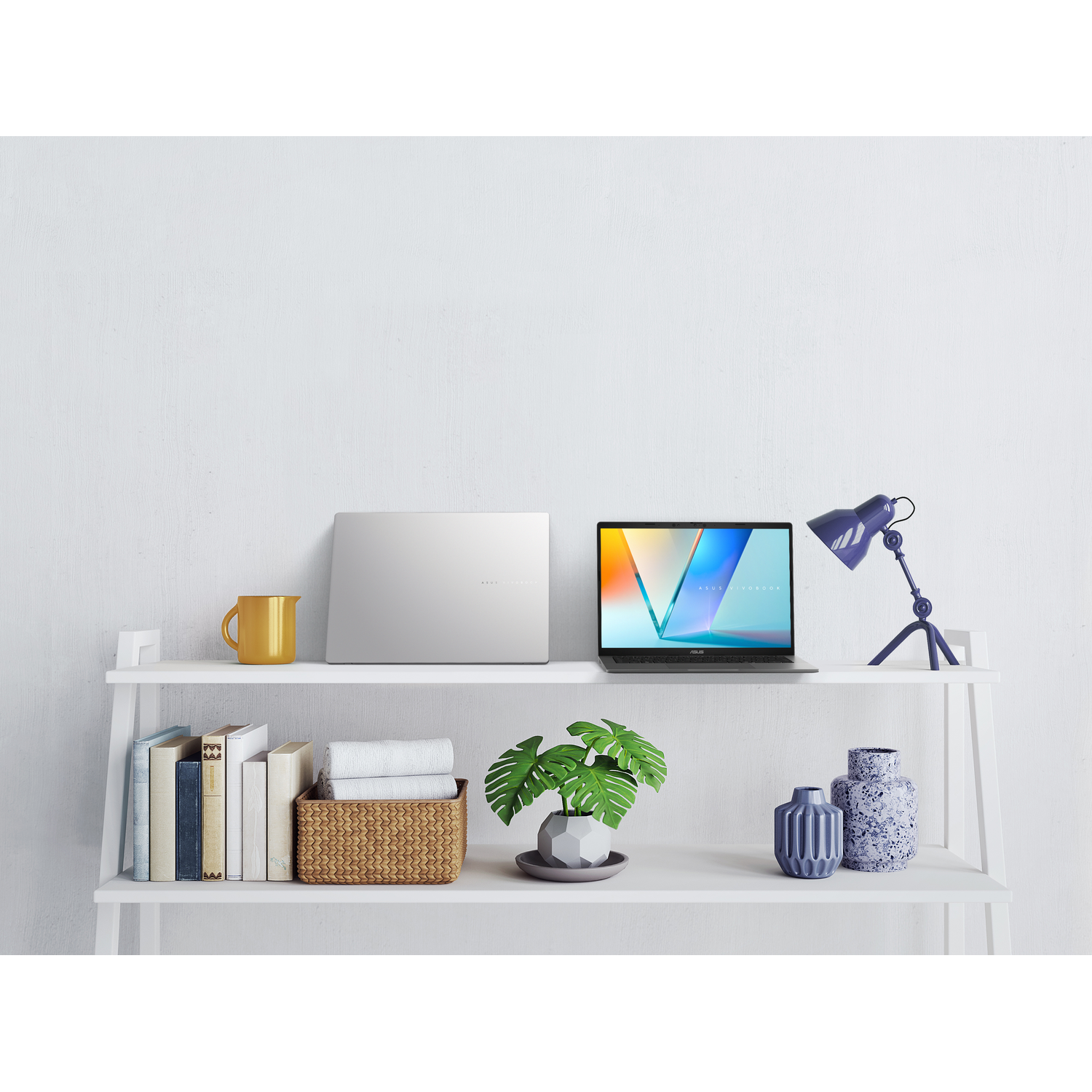 Laptop is on a shelf with books and a plant. The screen of the laptop is on. White background.