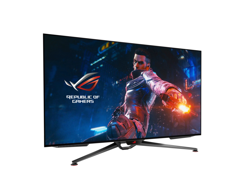 Un monitor para juegos muestra a un hombre en acción contra un fondo futurista. El monitor tiene un soporte distintivo y el logotipo ROG.