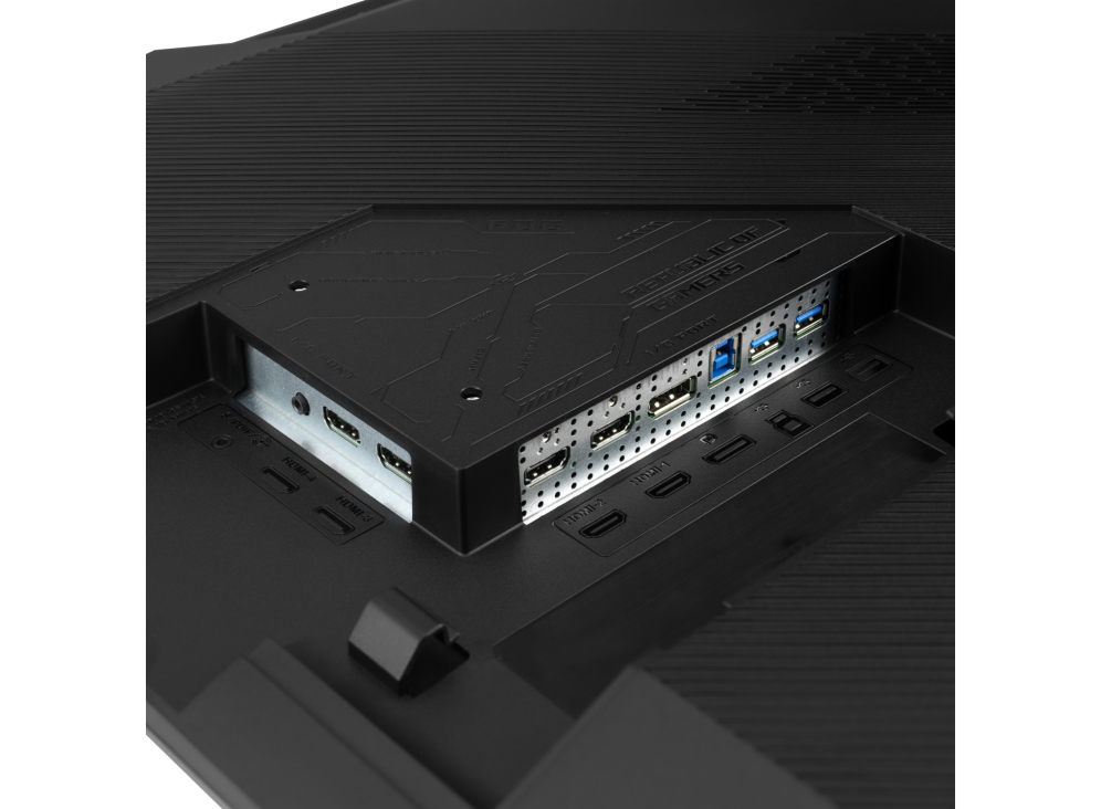 Parte trasera de monitor negro con puertos: HDMI, USB y otros. El texto dice 'Republic of Gamers'. Los puertos están etiquetados.