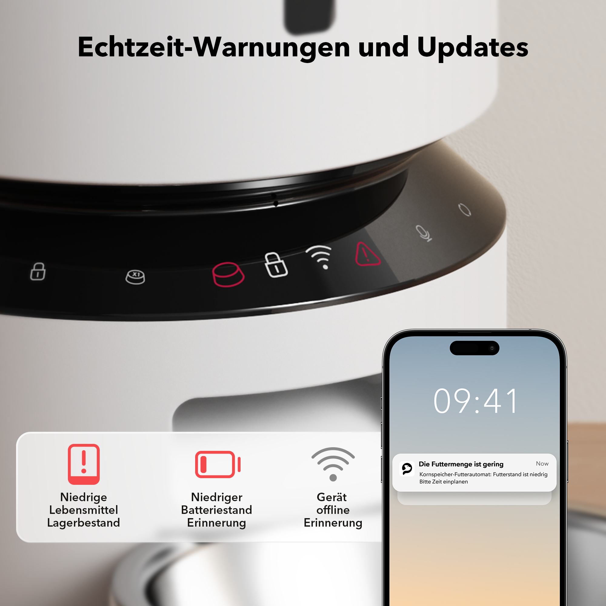 Nahaufnahme des Haustierfutterautomaten mit Telefon, das einen Warnhinweis bei niedrigem Futterstand anzeigt. Text-Overlay ist sichtbar.