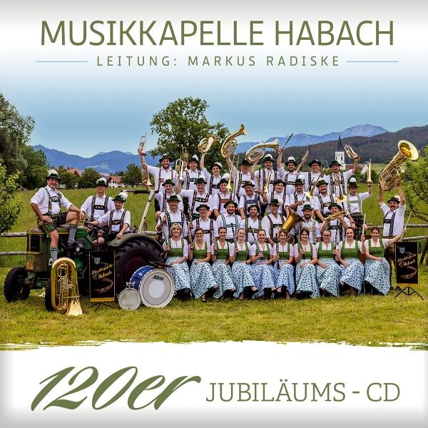 Albumcover mit einer Gruppe von Leuten mit Instrumenten auf einem Feld mit blauem Himmel.