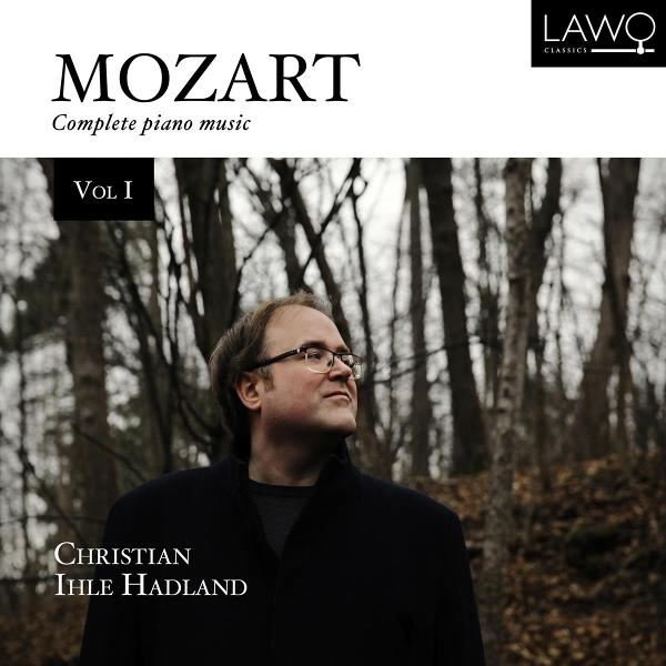 Albumcover eines Mannes mit Brille, der zur Seite blickt.