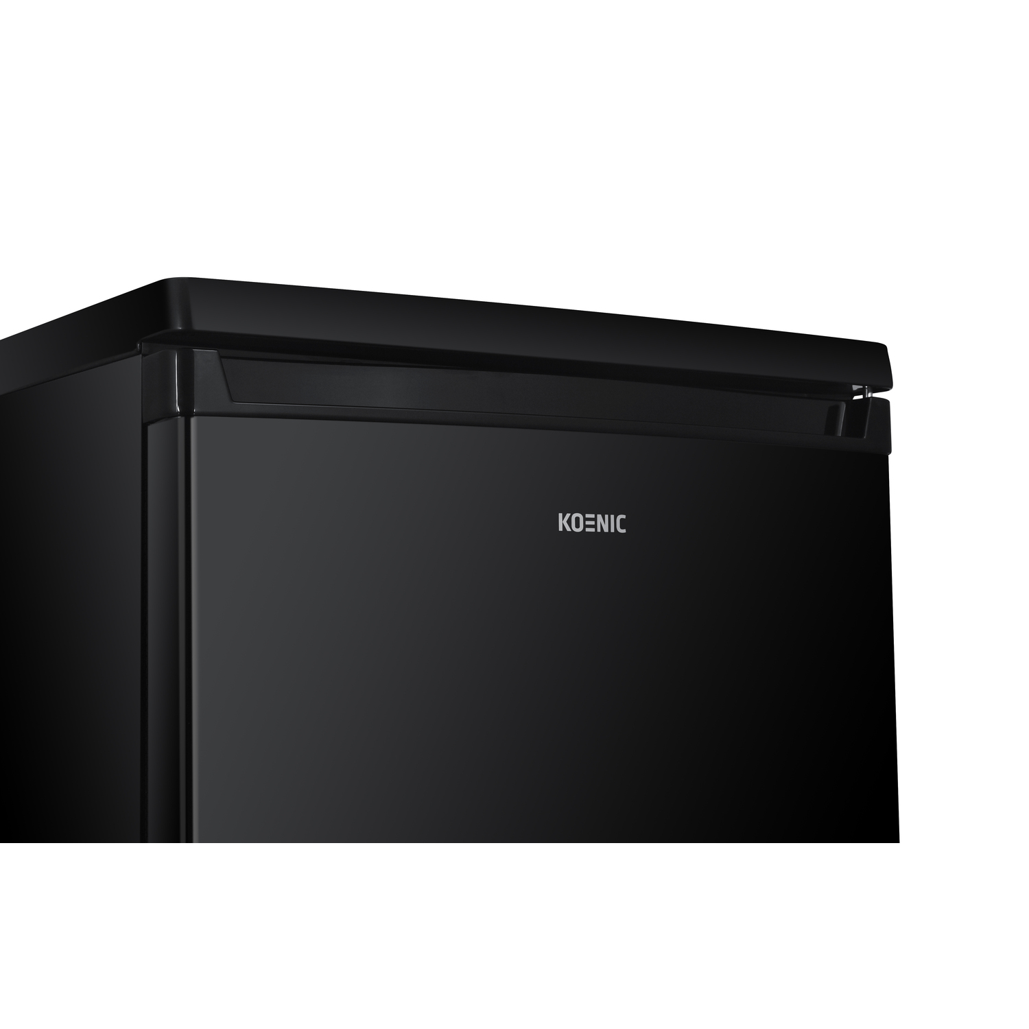 A close up of the Koenic logo on a black refrigerator. The logo is in silver.
