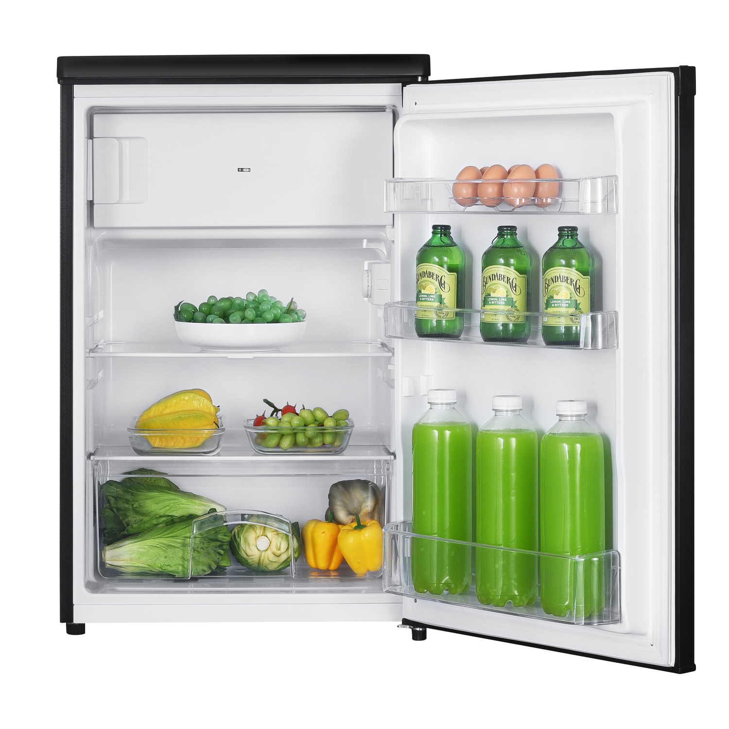 Open fridge with food: grapes, bottles, eggs, and vegetables.