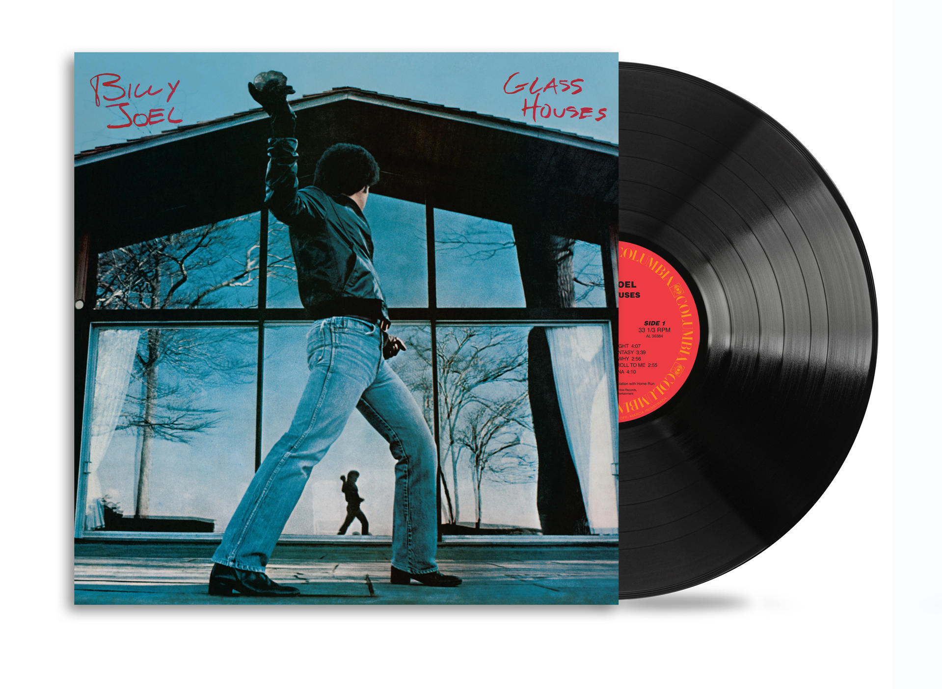Albumcover mit Billy Joel, der einen Stein auf ein Haus wirft. Glass Houses Album, mit Schallplatte.