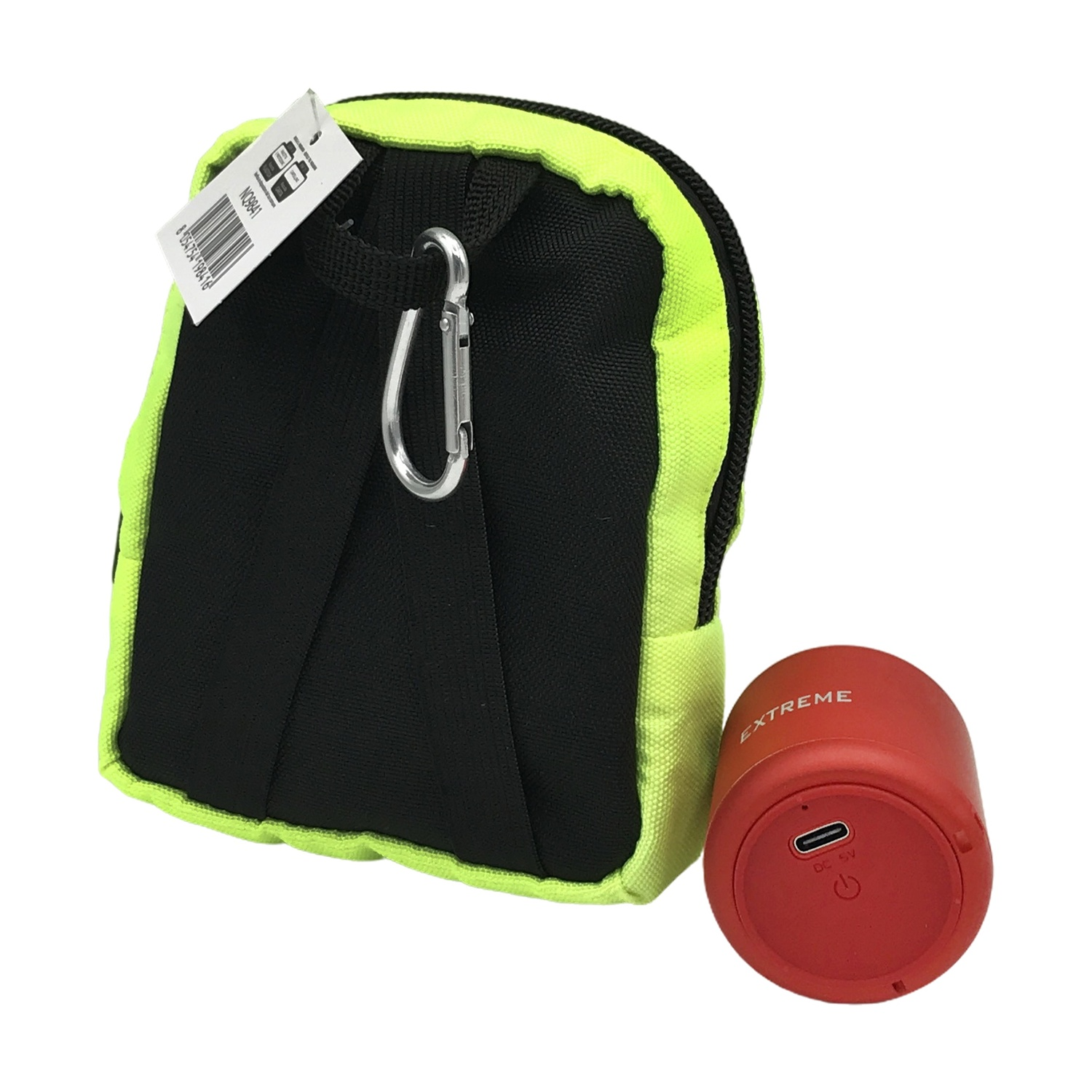 Una borsa verde e nera con un altoparlante rosso. L'altoparlante ha la scritta "EXTREME".