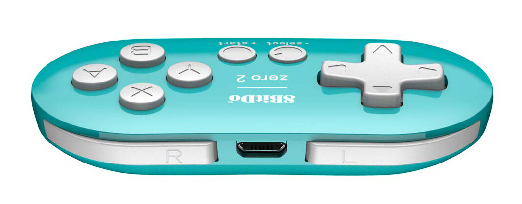 Turkusowy kontroler z białymi przyciskami. Posiada d-pad, przyciski X, Y, A i B oraz przyciski select i start.