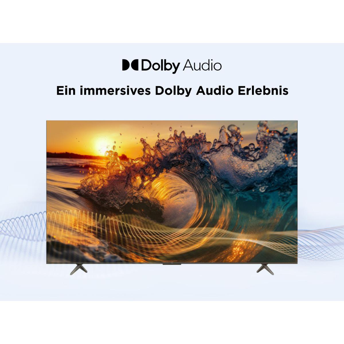 Ein Fernseher zeigt eine Welle bei Sonnenuntergang. Der Text darüber lautet: Dolby Audio, Ein immersives Dolby Audio-Erlebnis.
