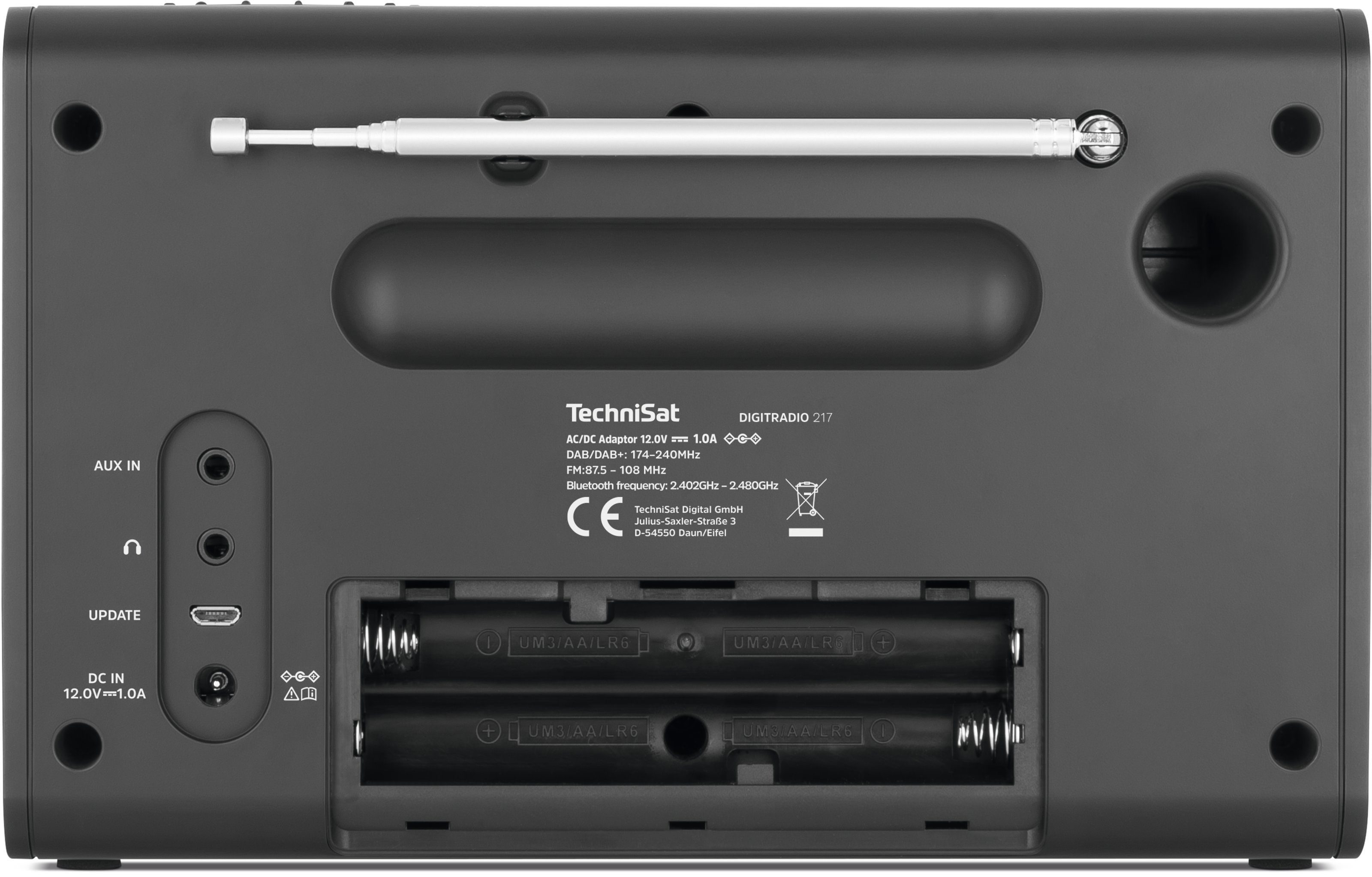 Die Rückseite eines schwarzen TechniSat Digiradio 217 mit verschiedenen Anschlüssen, Batteriefach und Antenne.