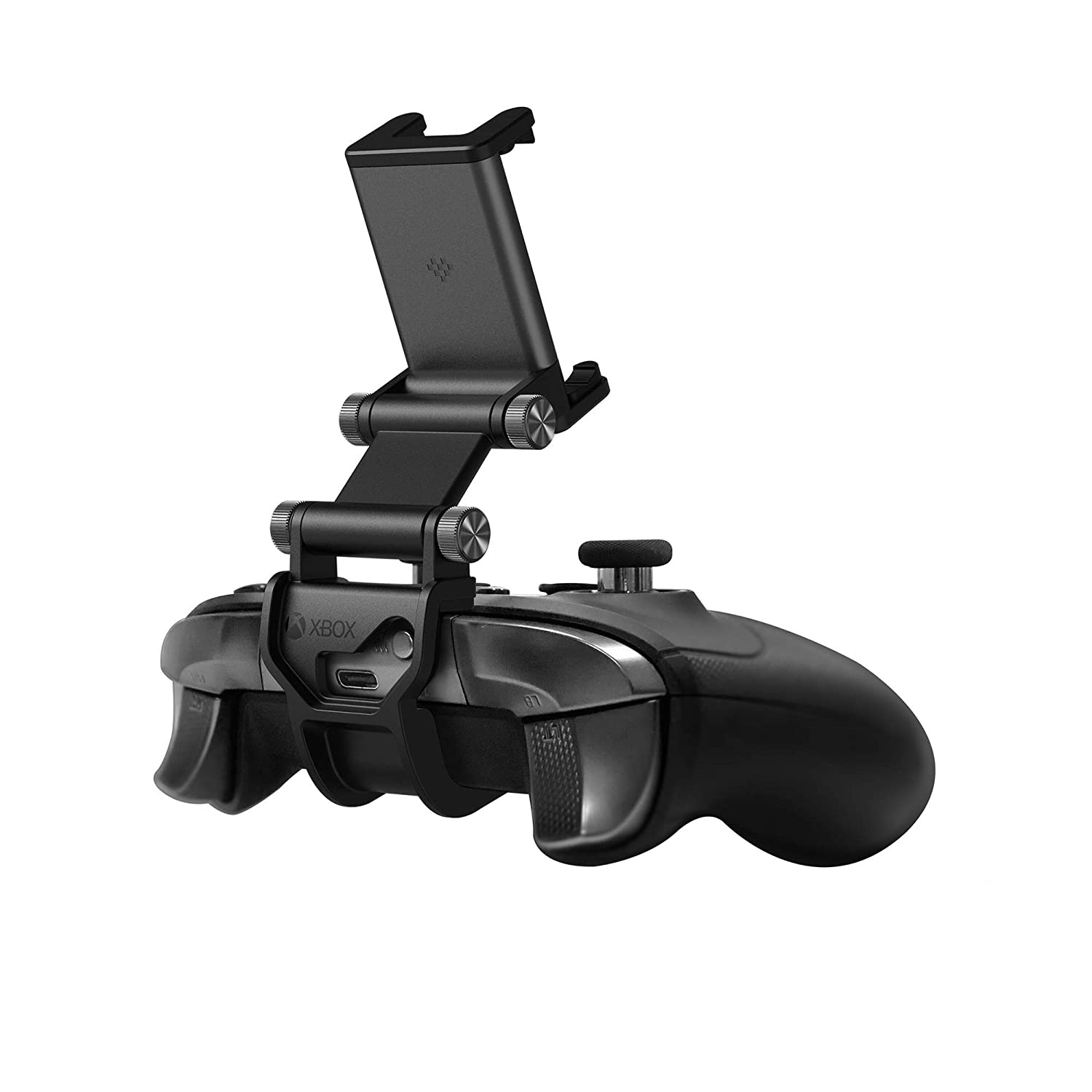 Czarny kontroler Xbox z dołączonym klipsem na telefon. Telefon trzymany nad kontrolerem.
