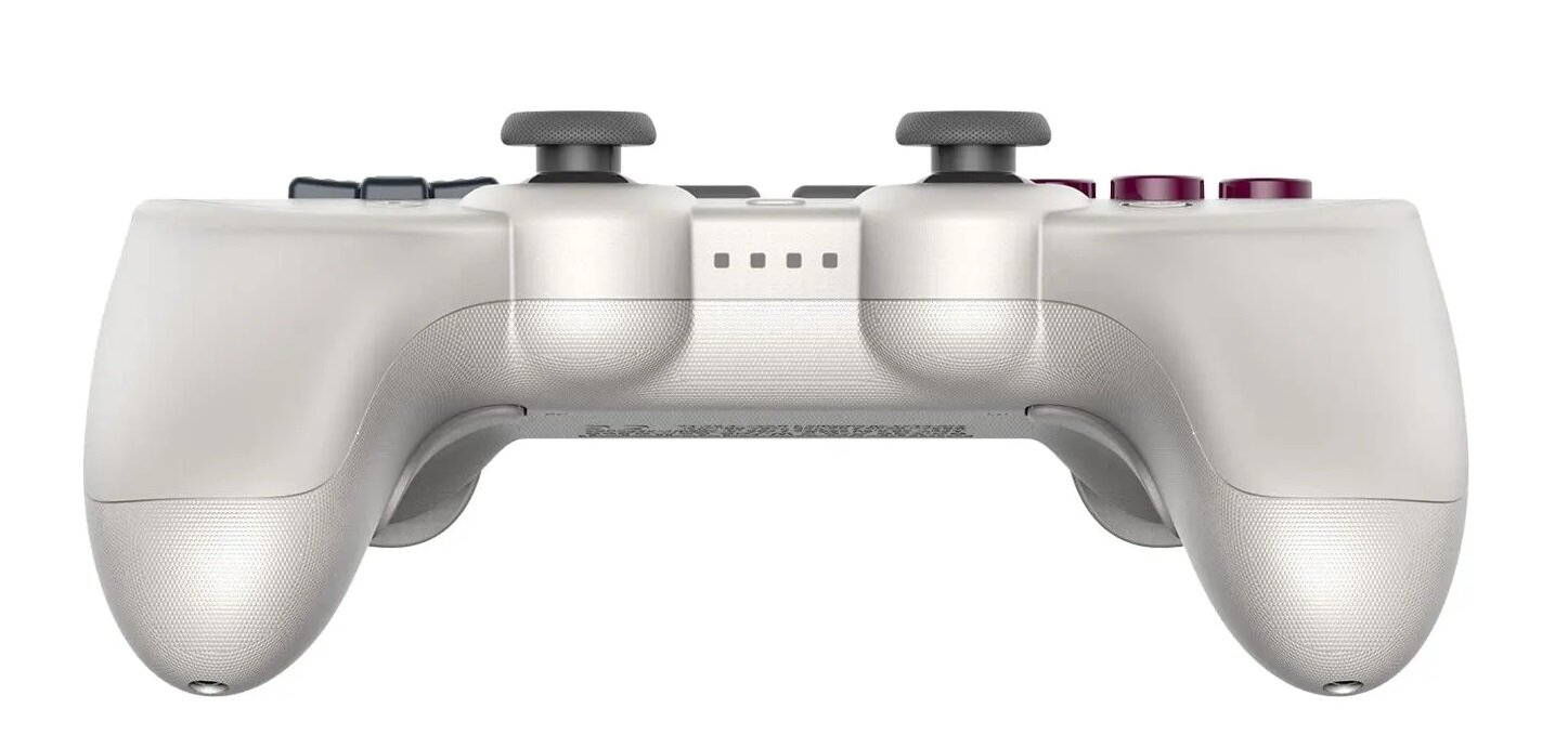 Biały gamepad. Ma dwa joysticki i kolorowe przyciski. Przyciski są bordowe. Powierzchnia jest teksturowana.