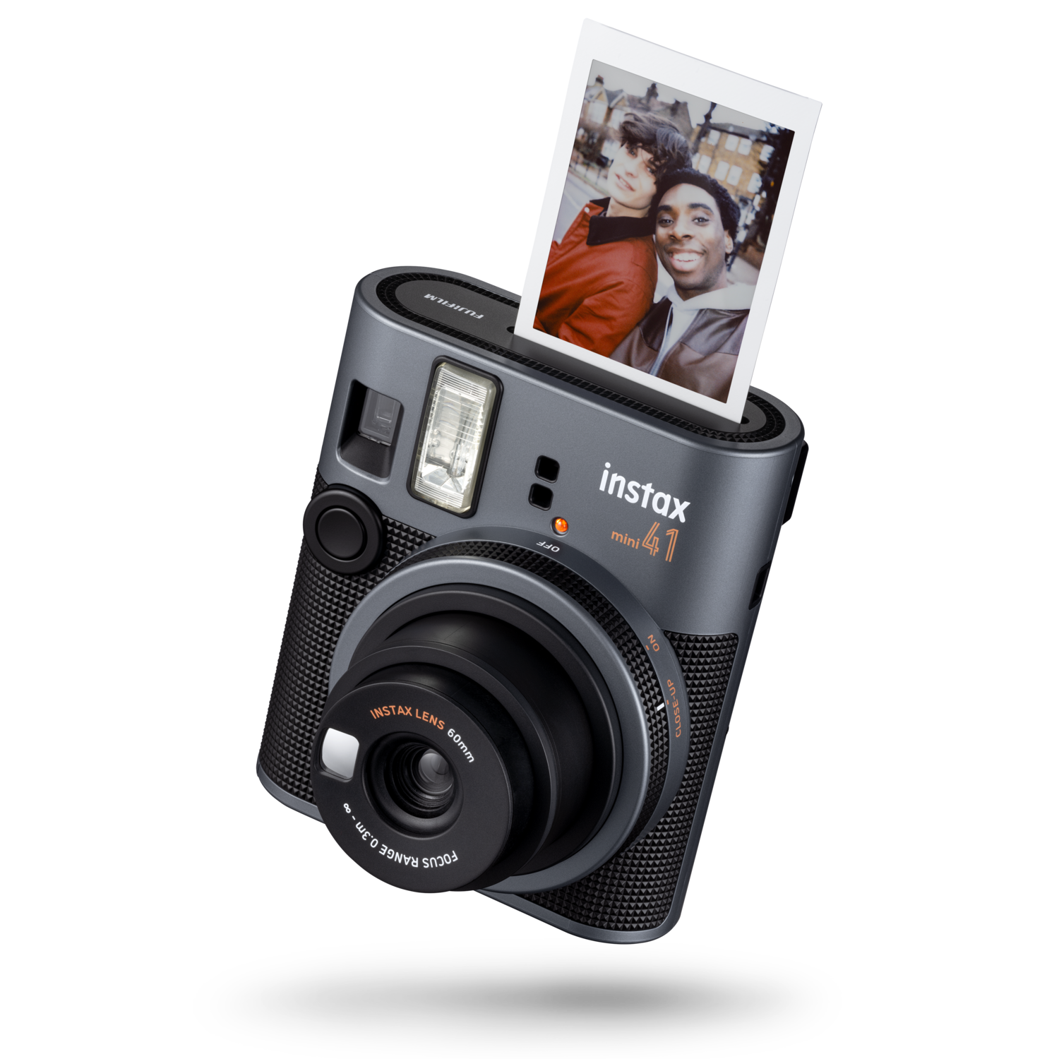 Instax mini 41 camera, a photo is ejected with two people.