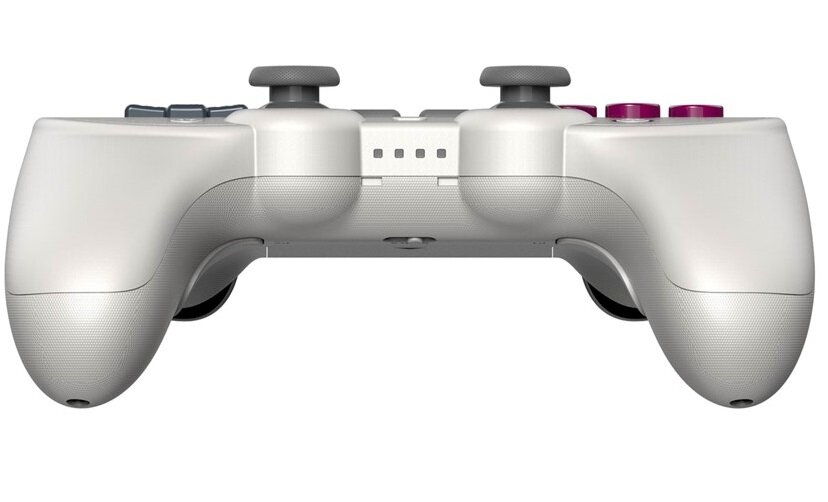 Tył białego kontrolera z szarymi i fioletowymi przyciskami. Kontroler ma elegancki design.