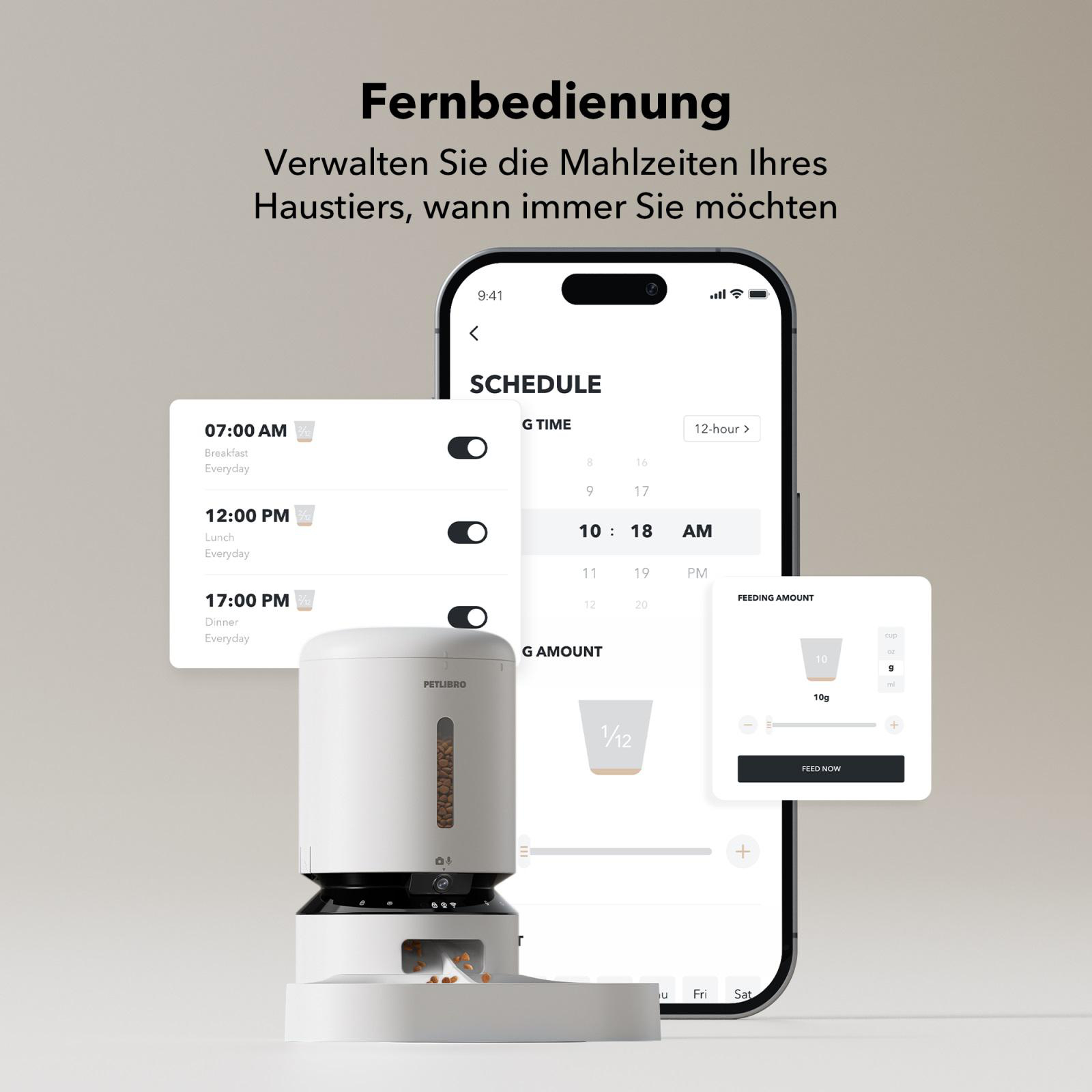 Telefon zeigt Futterplan. Futterautomat ist weiß. Plan zeigt Fütterungszeiten und -menge.