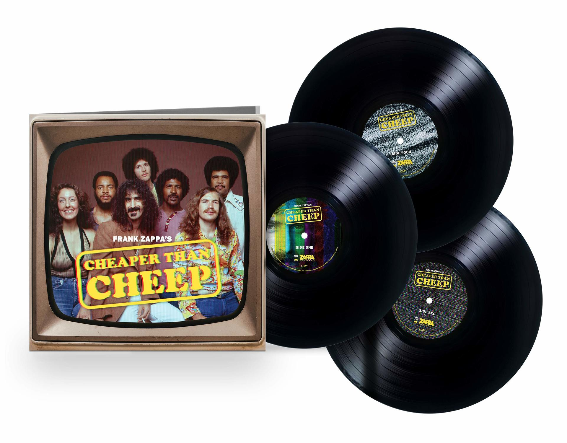 Album-Set: Box mit einem Fernsehbild einer Band und 3 schwarzen Schallplatten.