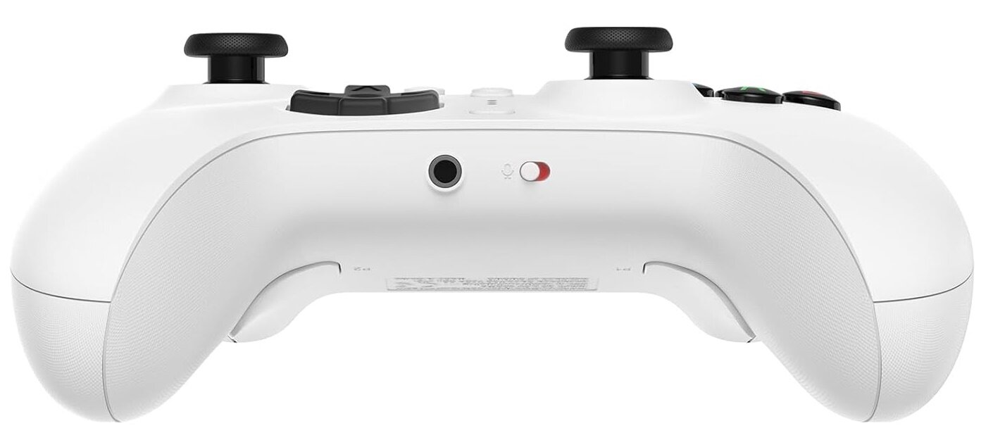 Tył białego kontrolera Xbox. Kontroler ma gniazdo słuchawkowe i kilka napisów.
