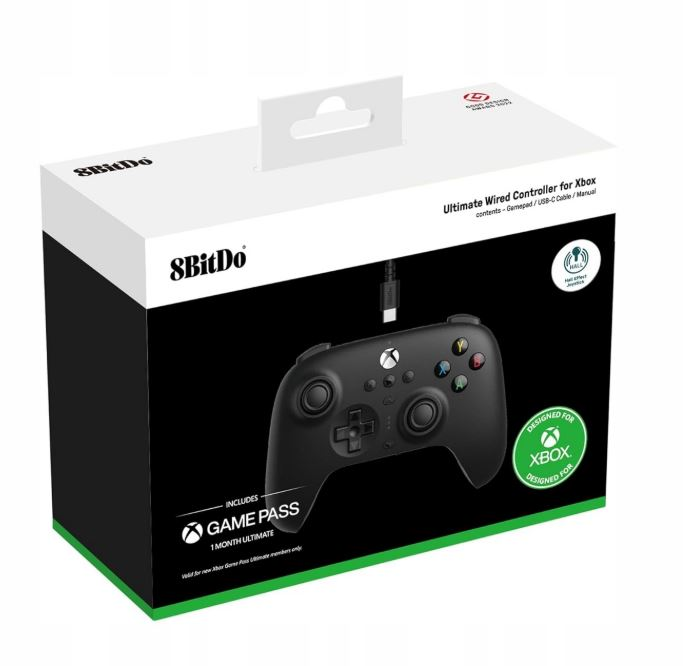 Czarny kontroler do gier w pudełku. Pudełko zawiera karnet na gry i logo Xbox.