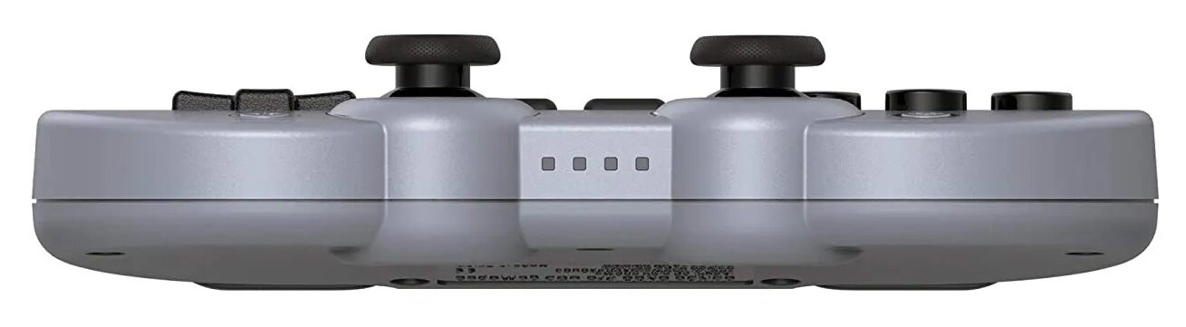 Widok z boku srebrnego kontrolera SN30 Pro, ukazujący joysticki, przyciski i porty.