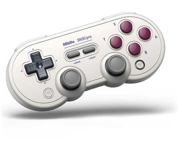 Biały kontroler 8Bitdo SN30 Pro z D-padem, przyciskami i napisem SN30 Pro.