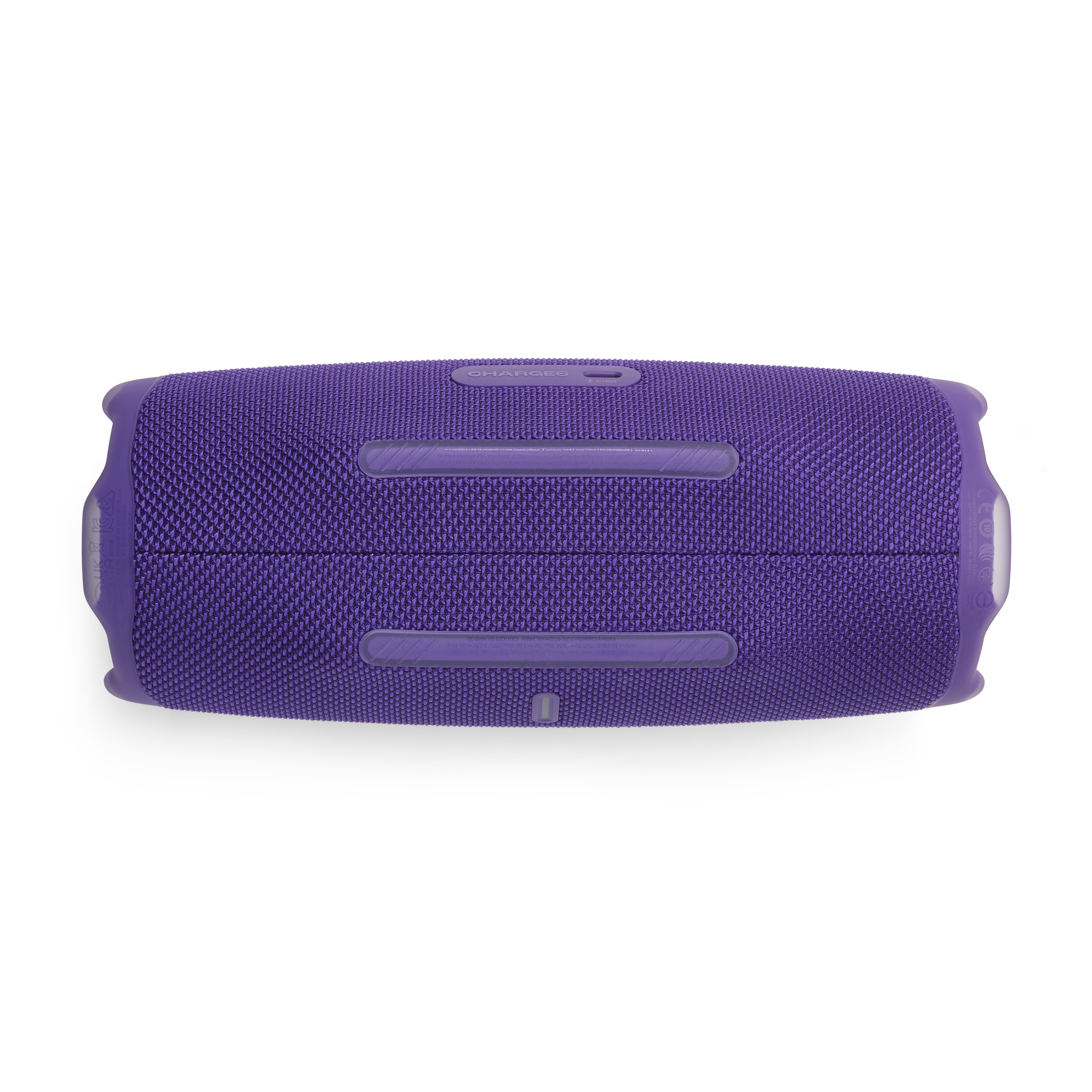 Haut-parleur JBL violet, vue de dessous. Deux pieds en caoutchouc sont visibles. Fond blanc.