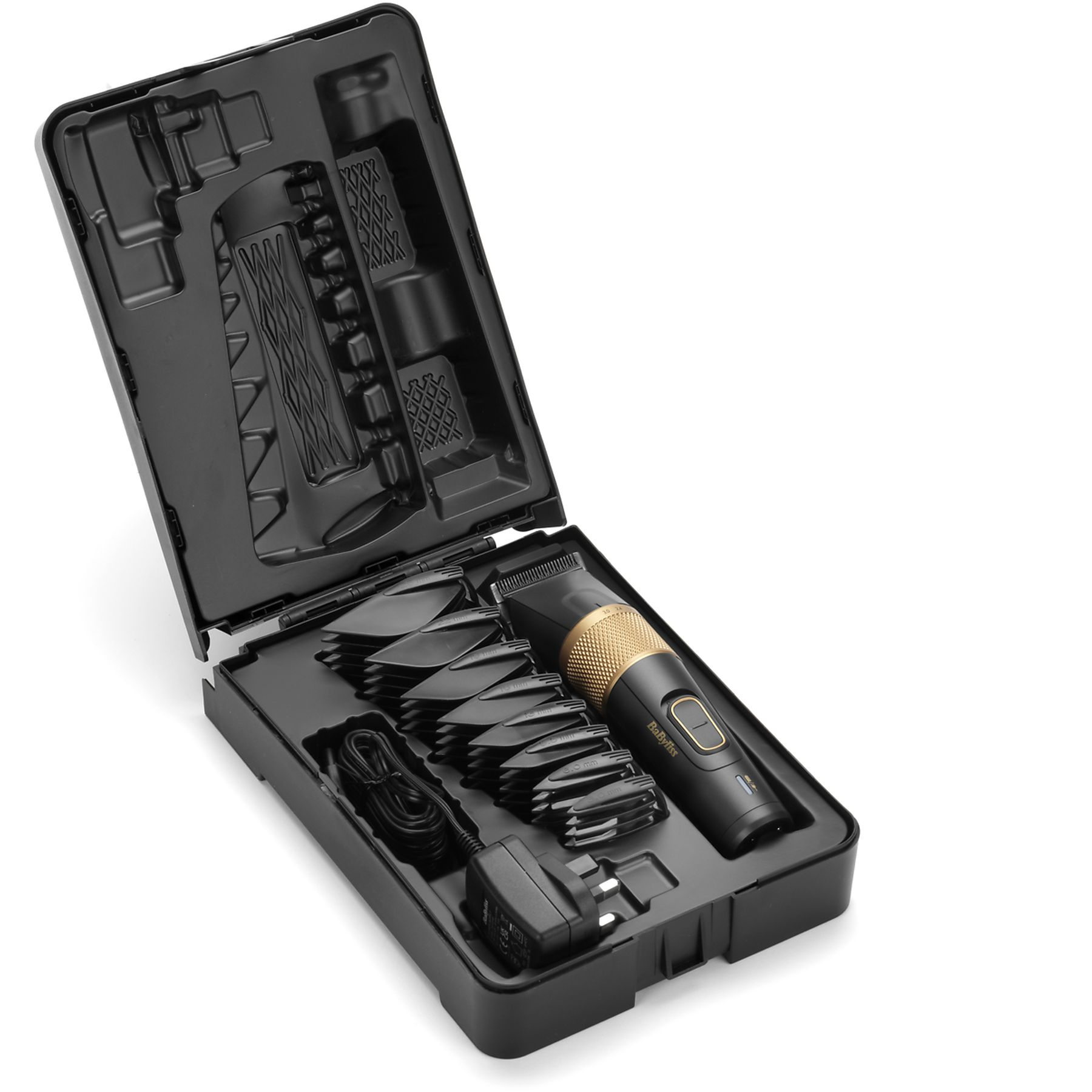 Trymer Babyliss i akcesoria starannie ułożone w czarnej walizce.