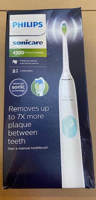 Pudełko szczoteczki Philips Sonicare, ze szczoteczką i tekstem o korzyściach.