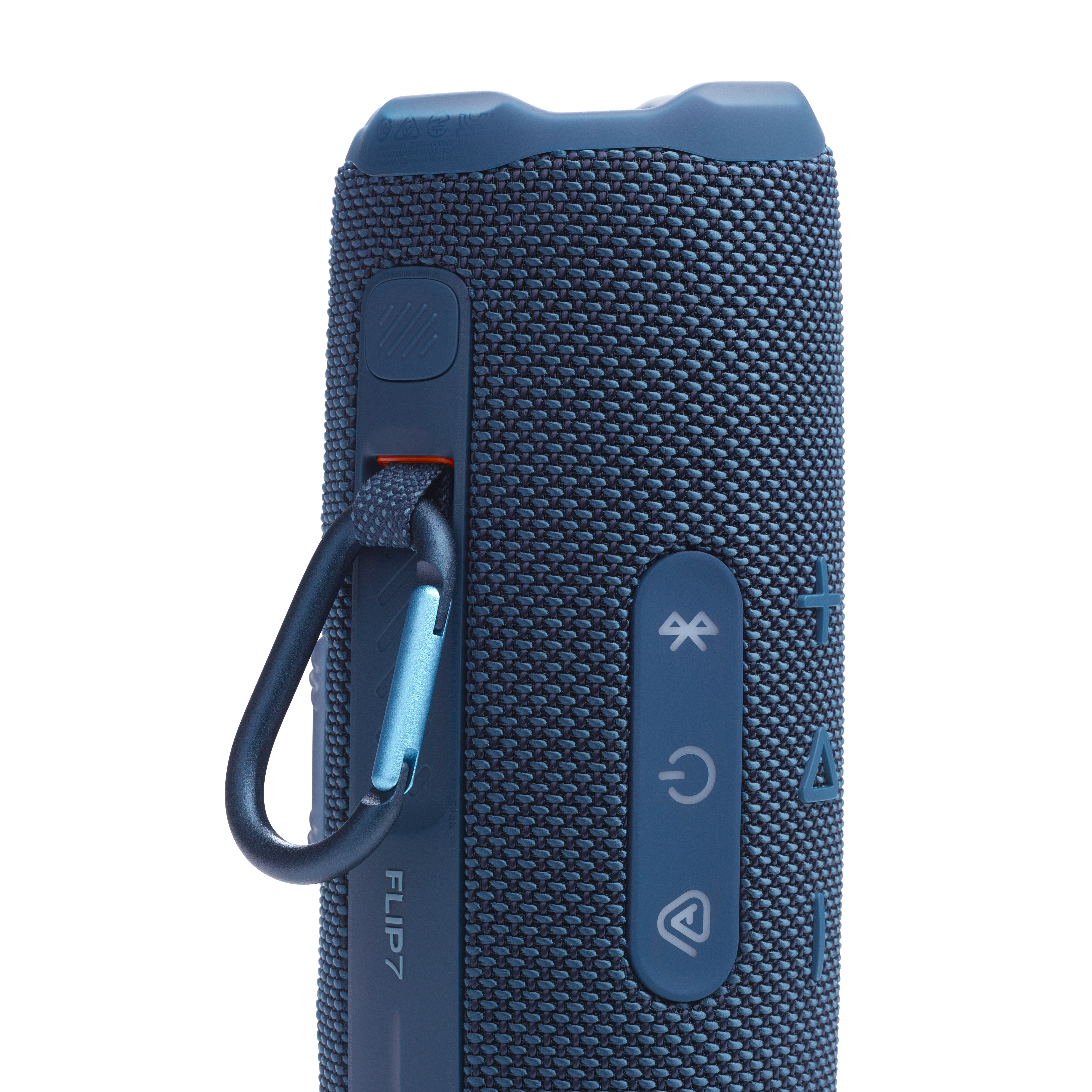 Blauer JBL-Lautsprecher, mit Knöpfen an der Seite und FLIP7-Text, auf weißem Grund.