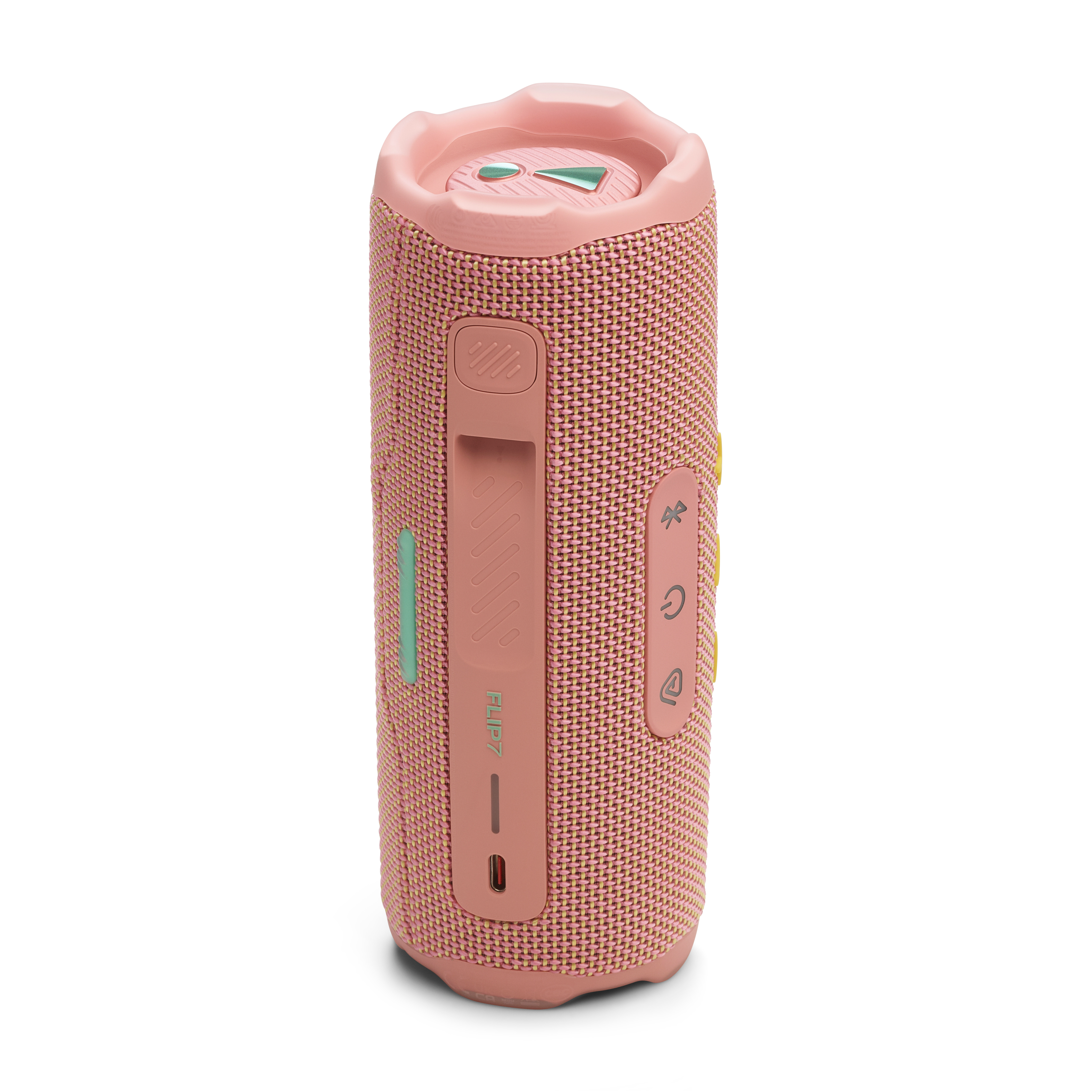 Ein pinkfarbener JBL Flip 6 Lautsprecher, Seitenansicht, mit Ladeanschluss und dem JBL-Logo.