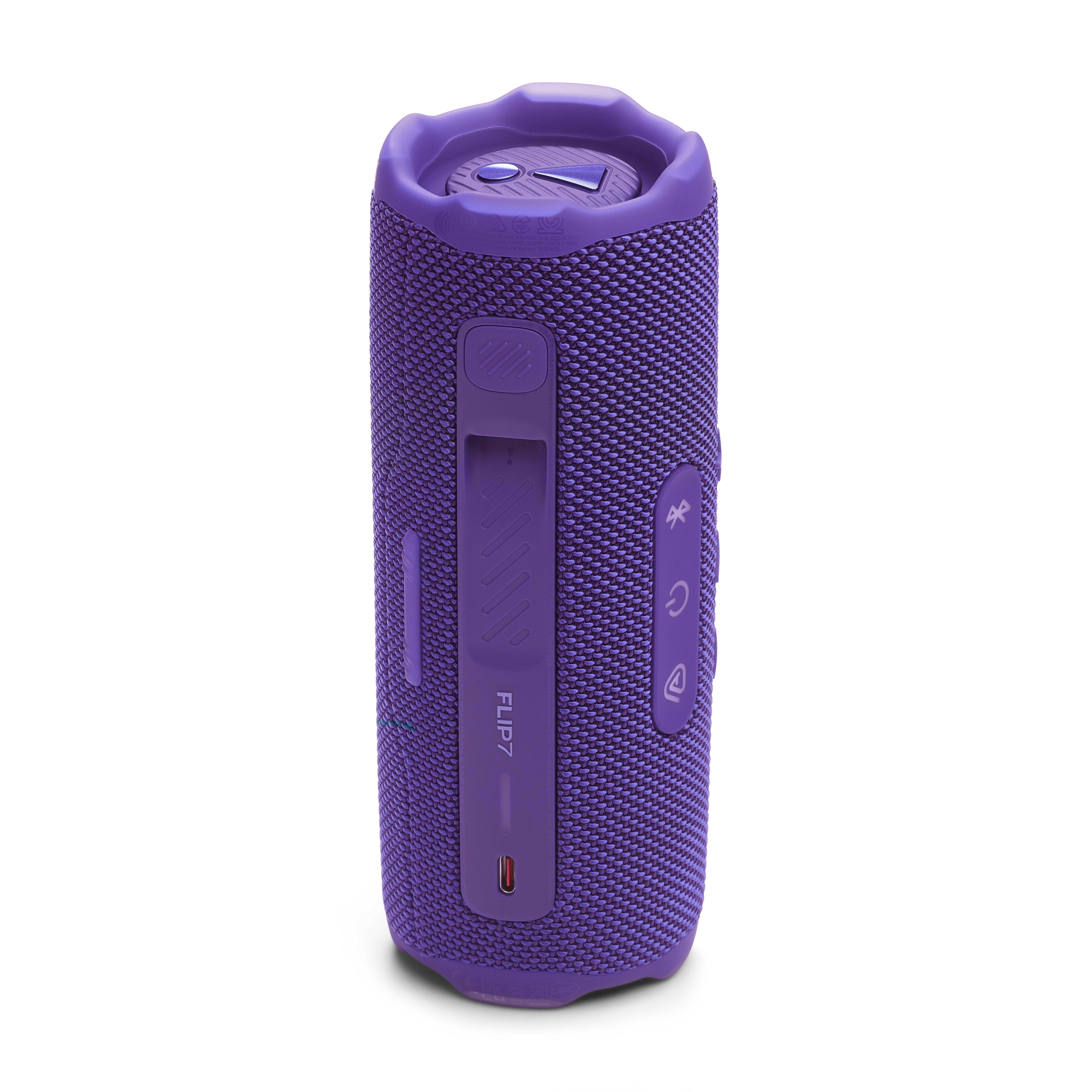 Altoparlante JBL Flip 7 viola, forma cilindrica. Pulsanti e porte visibili. Sfondo bianco.