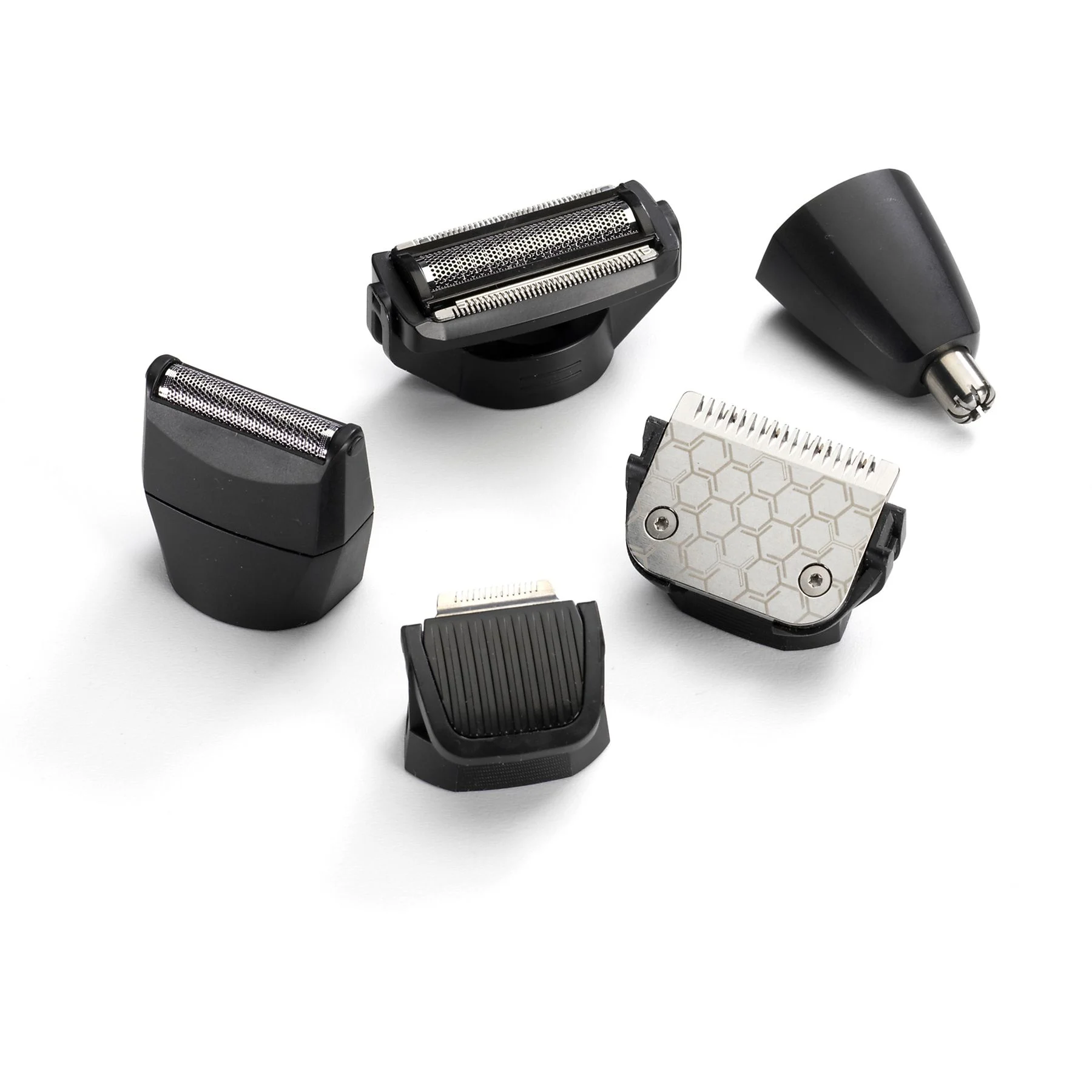 Różne głowice trymera i nasadki, w tym ostrza i trymer do nosa.