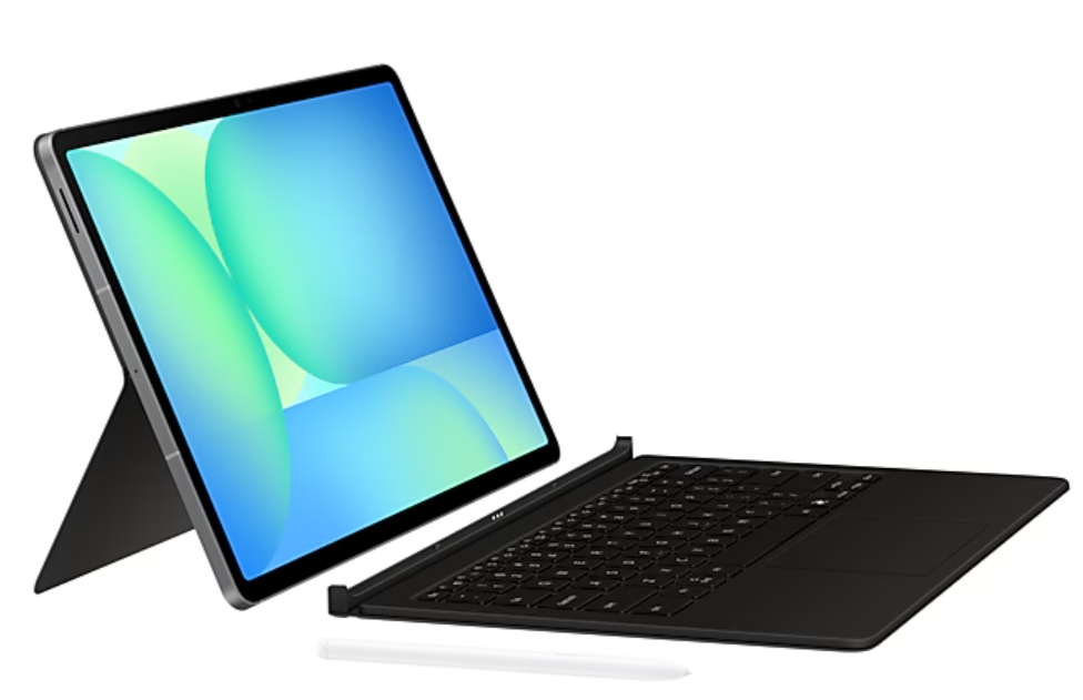 Klavye ve kalemli tablet. Tablet, yeşil ve mavi bir grafik görüntülüyor.