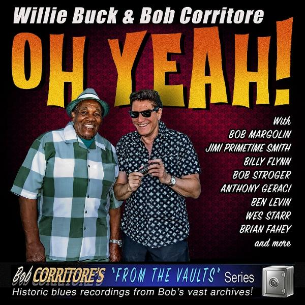 Zwei Männer lächeln vor einem Blues-Albumcover mit dem Text: Willie Buck & Bob Corritore.